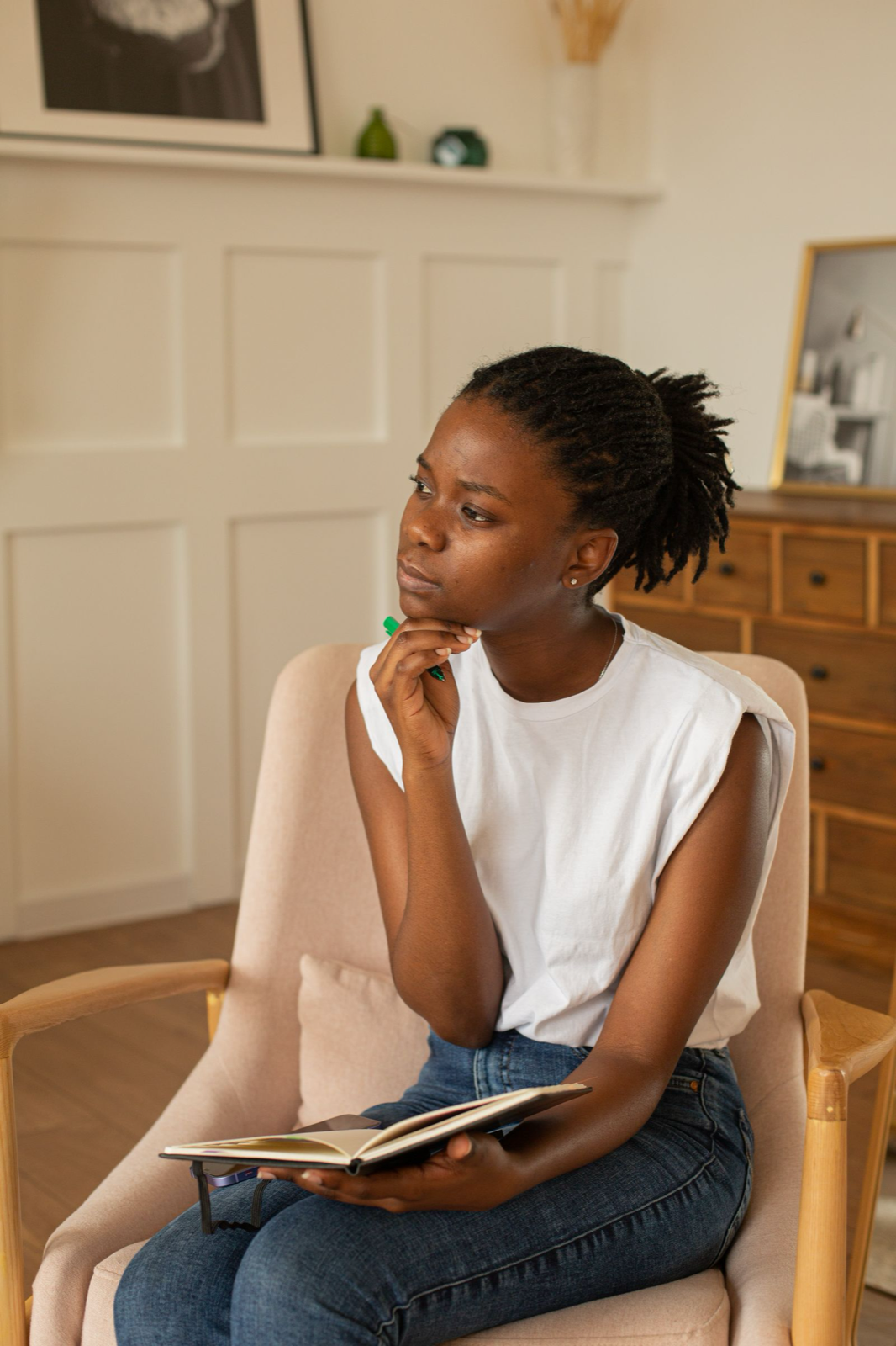 Black woman journaling